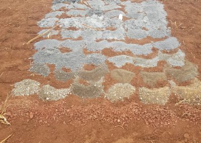 Geological logging of borehole drilling soil samples.